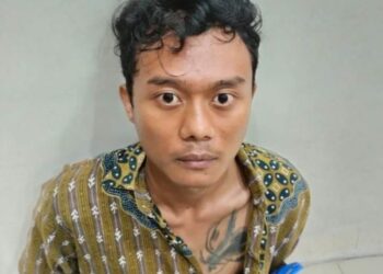 Begini Tampang Pembunuh Guru SDN 08 Desa Bujung Buring Saat di Tangkap Polisi
